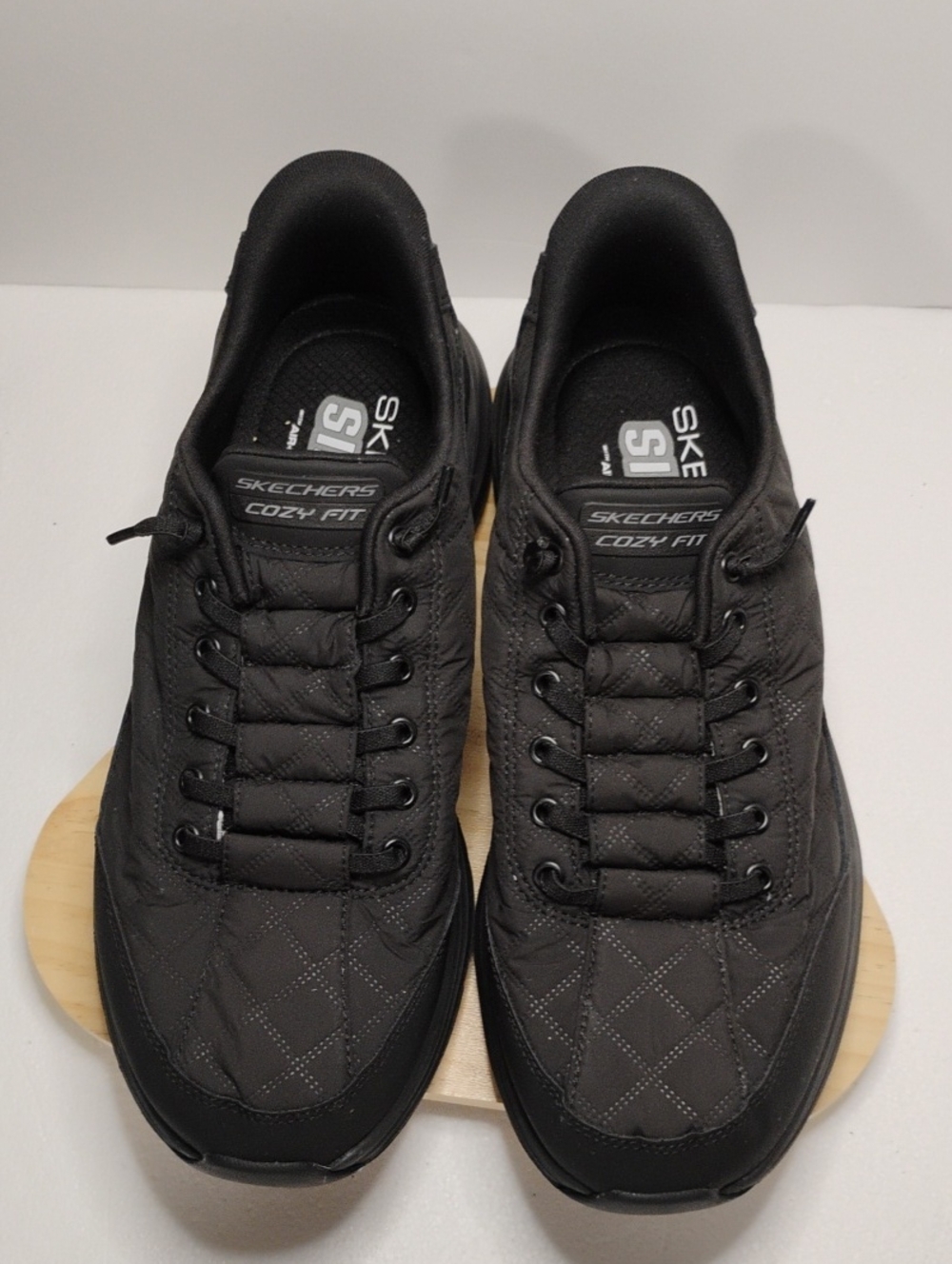 Skechers Men’s Black Quilted Slip-On Sneakers